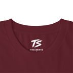 Close-up of a maroon crewneck t-shirt with a white 'TS' logo and 'TREESHIRTZ' text printed inside the collar, on a white background.