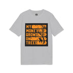 A heather gray short-sleeve t-shirt with a graphic print on the front. The graphic features a black background with distressed orange text reading 'MY MONEY GROWS ON TREES' and a black silhouette of a tree.