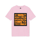 A light pink short-sleeve t-shirt with a black rectangular graphic on the chest featuring the text 'MY MONEY GROWS ON TREES' in orange lettering with a tree silhouette.